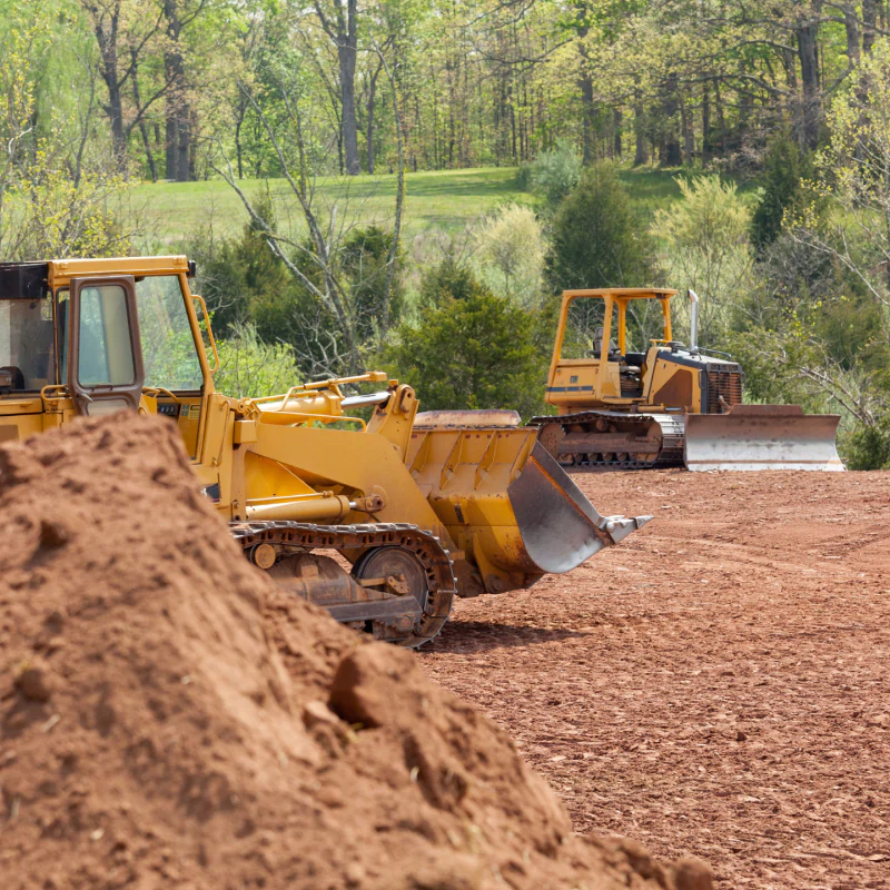 land clearing work using two small bulldozer
